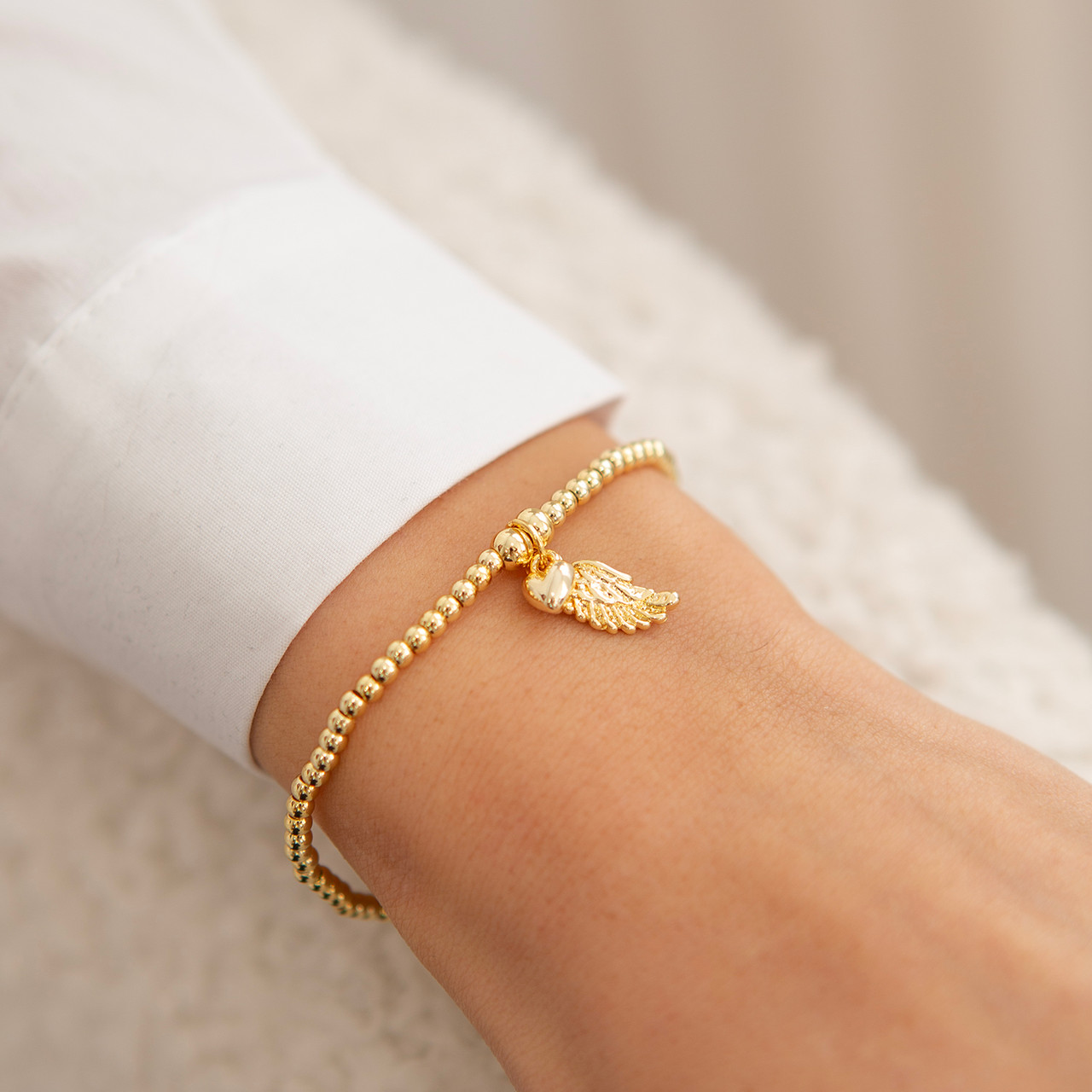 Life Charms Angel Wing Bracelet in Gold 2 IMG 1422.jpeg