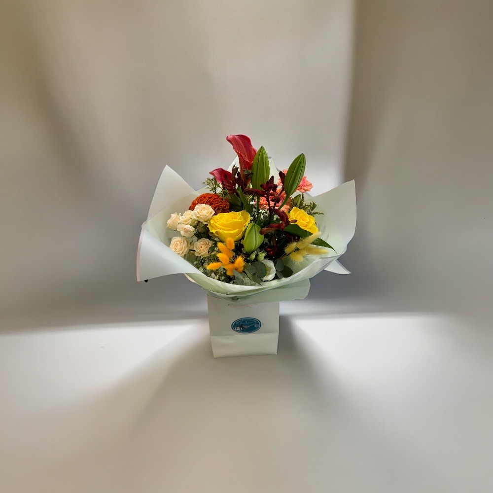 Hand Tied Bouquet in Gift Bag – Yellow/Orange Colours 2 Hand tied bouquet yellow orange theme.jpeg