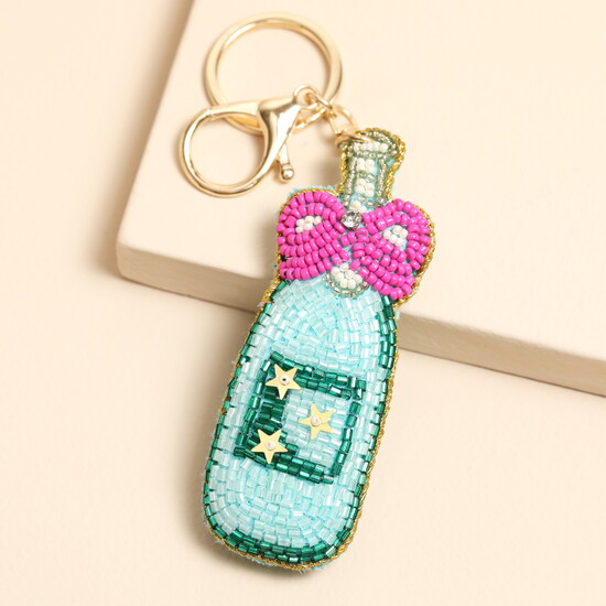 BEADED CHAMPAGNE WITH PINK BOW KEYRING AND BAG CHARM IMG 0889.jpeg